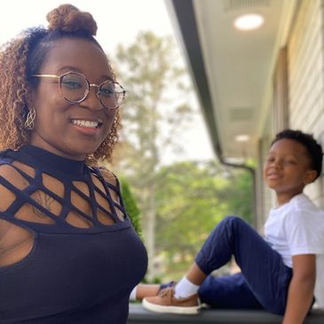 Ms Tiffany with a child